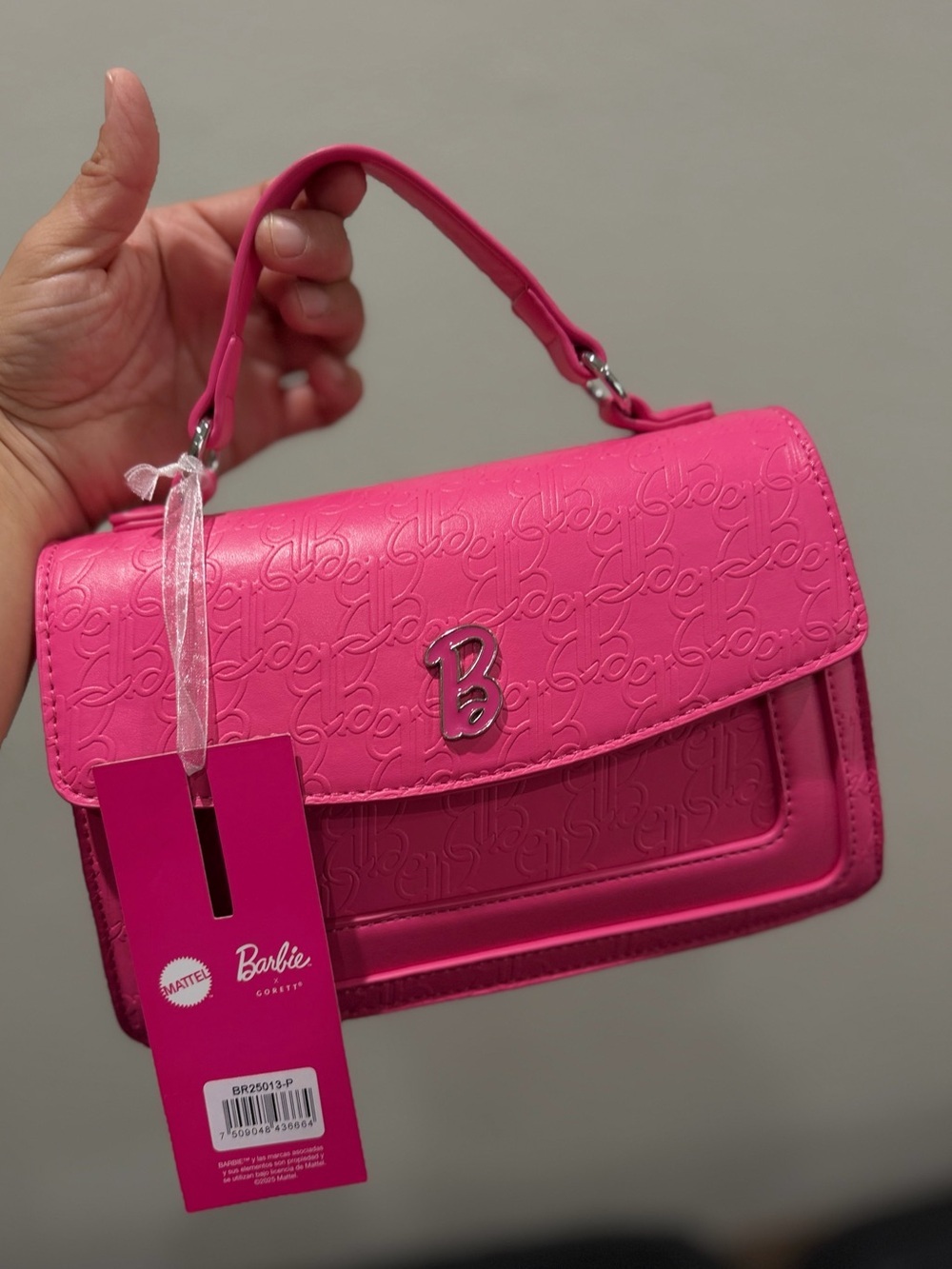 Barbie RarHot Pink Embossed Mini Top-Handle Bag
Rear limited edition BARBIE bran